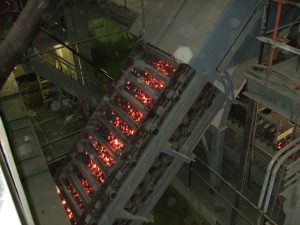 Hot ore inside a conveyor